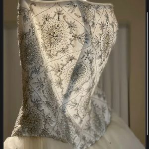 Brand New with tags wedding dress by Michaelangelo size 12